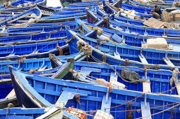 Typical blue fishing boats in the harbor of Essaouira