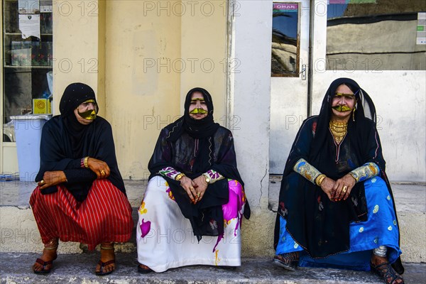 Local traditionally dressed women