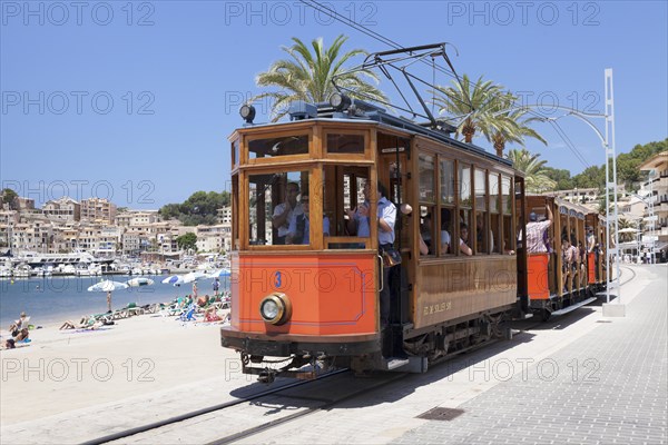 The historic ""Red Lightning"" tram on the promenade