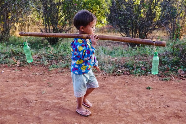 Boy fetching water