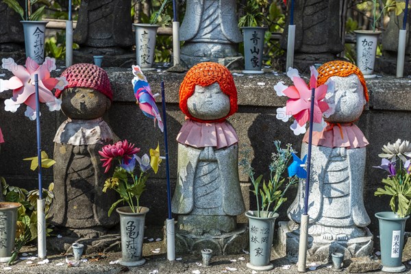 Jizo statues with red caps