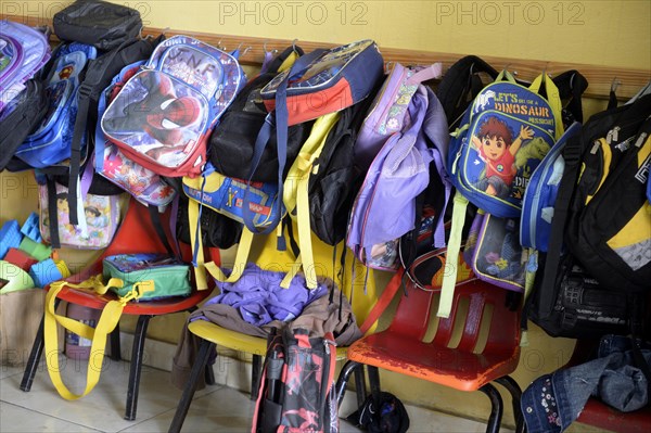 Kindergarten bags hanging on the wall