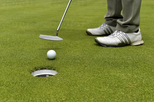 Golfer putting