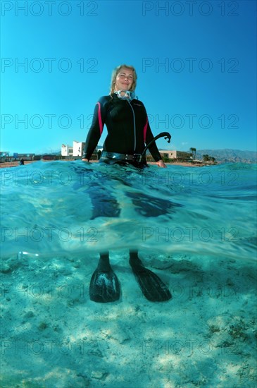 Freediver standing in the water