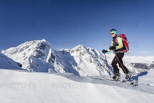 Ski mountaineer during the ascent of Mt Seespitz at Deutschnonsberg