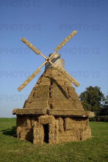 Windmill made of straw bales