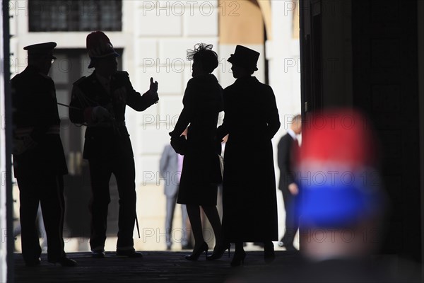 Bodyguard of the prince and visitors at the entrance of the Prince's Palace on the national Fete du Prince