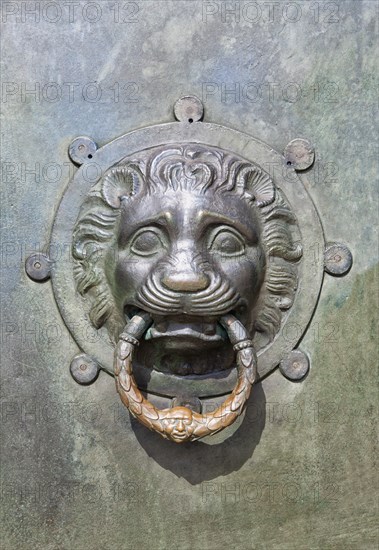 Door knocker at the entrance portal