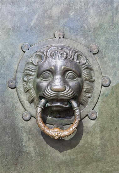 Door knocker at the entrance portal