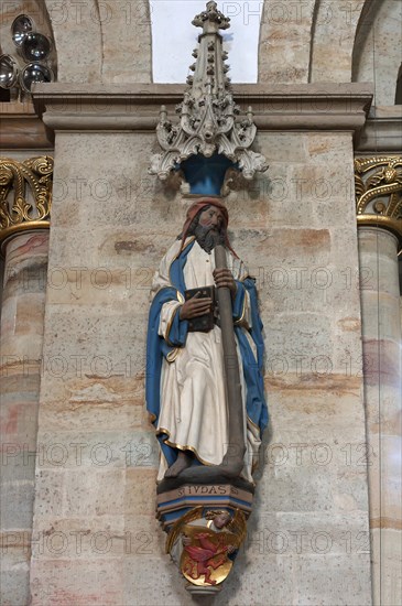 Sculpture of Judas inside the Late Romanesque St. Peter's Cathedral