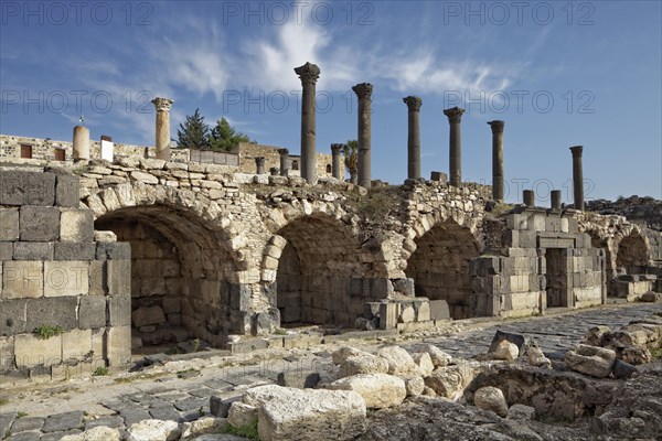 Road for vendors underneath the pillars of the church terrace and the main church