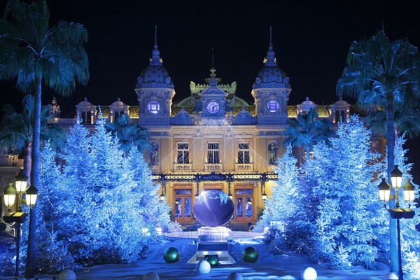 Square of the Monte-Carlo Casino at Christmas time with illuminated Christmas trees