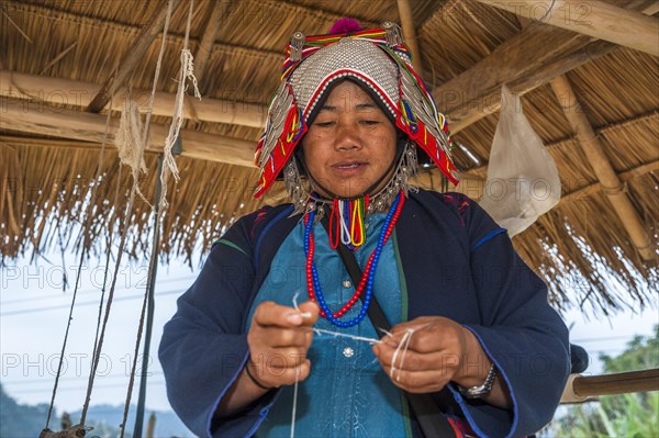 Traditionally dressed woman from the Akha people