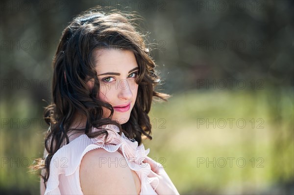 Portrait of a young woman with brown hair