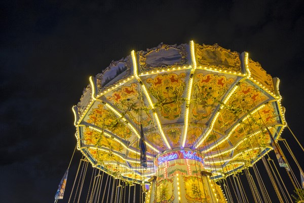 Chair Swing ride at Hamburger DOM funfair at night