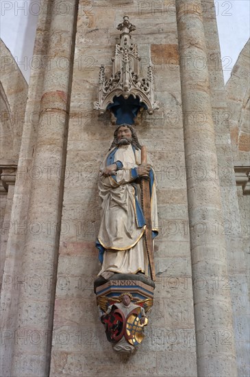 Sculpture of Simon inside the Late Romanesque St. Peter's Cathedral