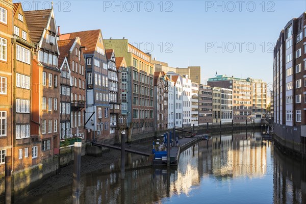 Old houses along the Nikolaifleet canal in early morning