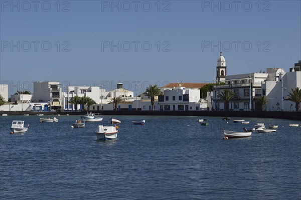 Redesigned harbour of El Charco de San Gines with the church Iglesia de San Gines
