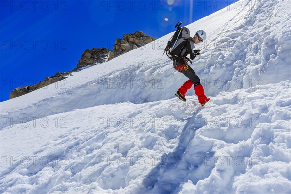 Mountaineer abseiling from Mt Col Blanc onto the Plateau du Trient