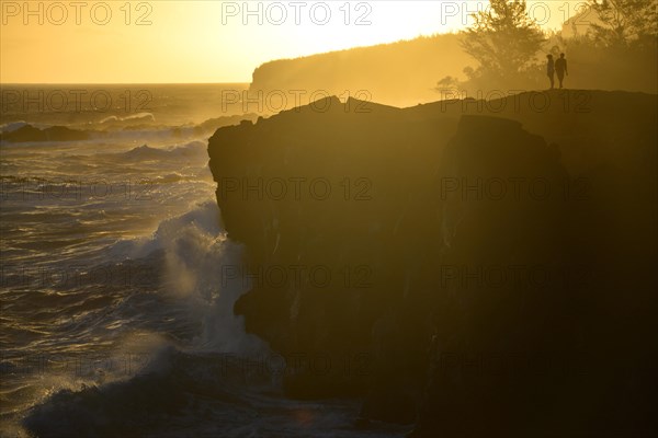 Hikers at sunset