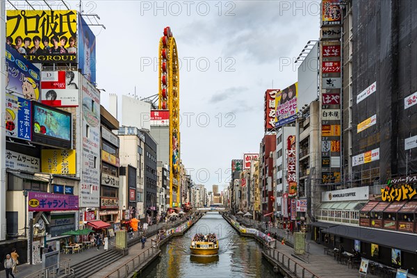 Tourist boat on the Dotonbori canal