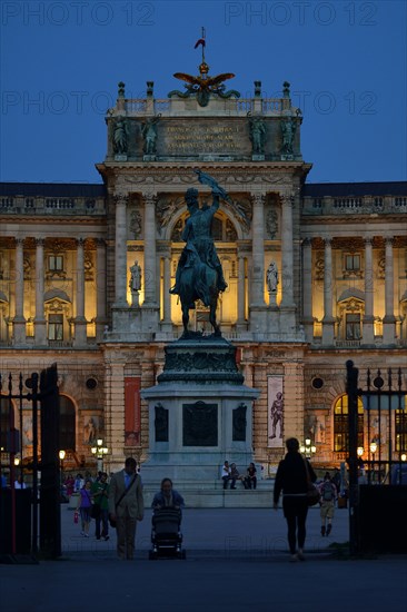 Hofburg Palace at Heldenplatz square with the equestrian monument of Archduke Charles