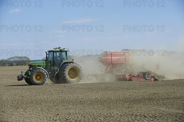 Tractor with seed drill