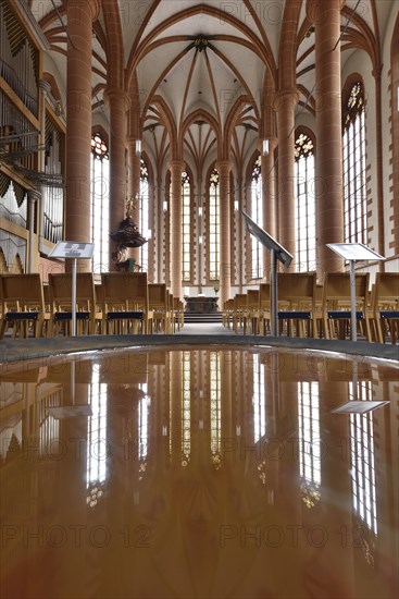 Reflection in baptismal font