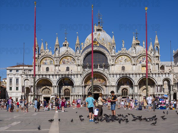 Basilica St. Mark in St. Mark's Square filled with tourists