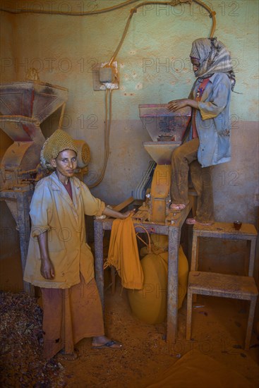 Women working in a Berbere red pepper spice factory at the Medebar market