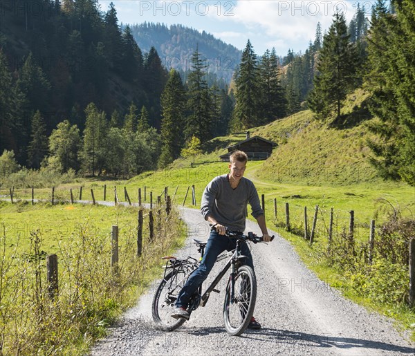 Young man on bicycle