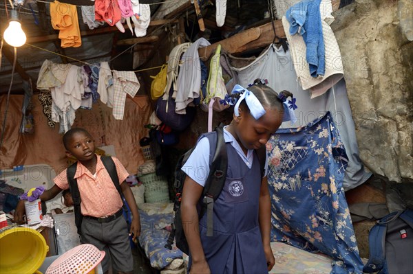 Brother and sister in school uniforms