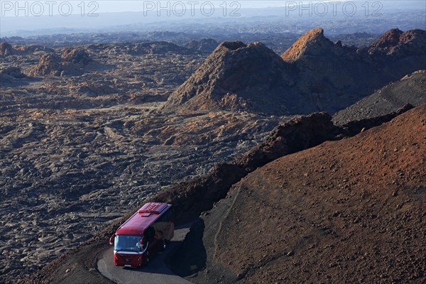 Tourist bus passing through the fire mountains