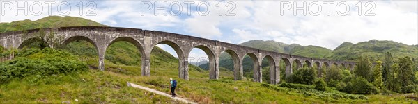 Hiker under Glenfinnan Viaduct