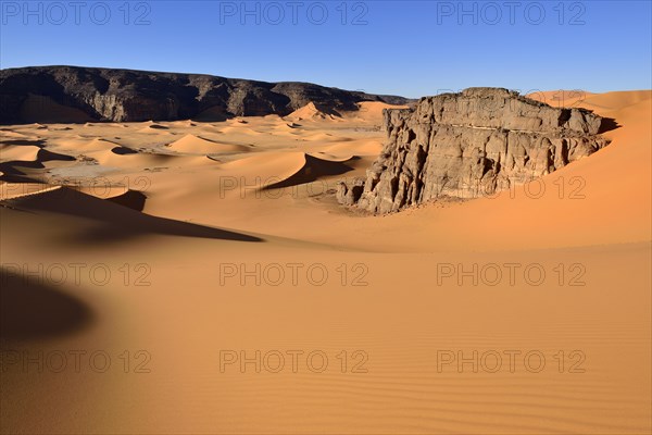 The sand dunes and rocks of Moul Naga