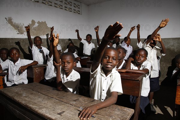 School children in school uniform during class