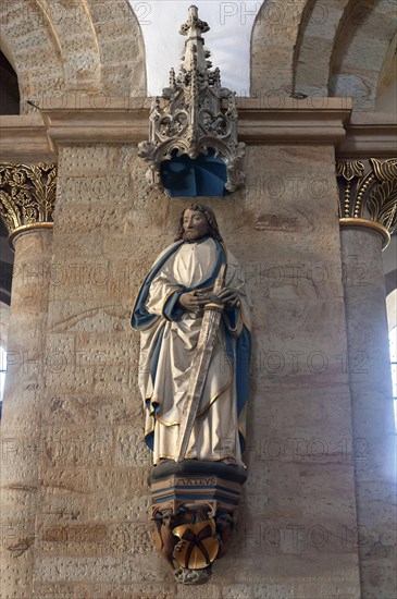 Sculpture of Matthew inside the Late Romanesque St. Peter's Cathedral