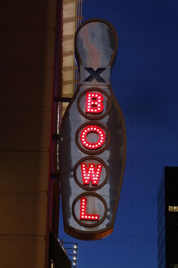 Neon light in the shape of a bowling pin