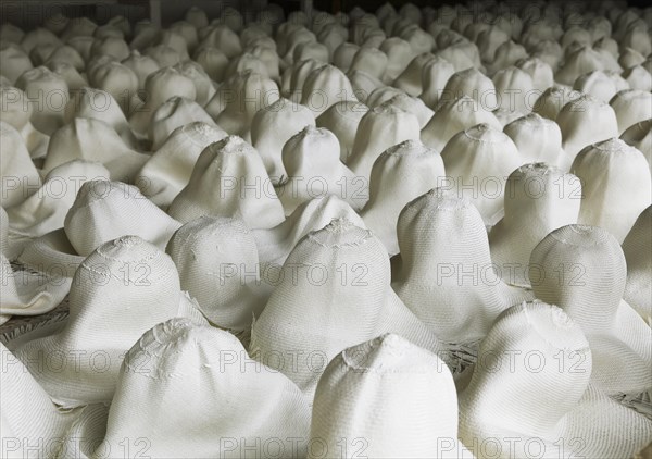 Moulded blank Panama hats are left to dry out