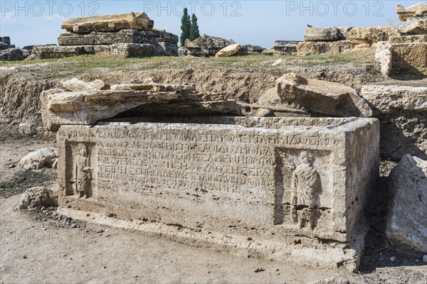 Sarcophagus with reliefs and inscriptions