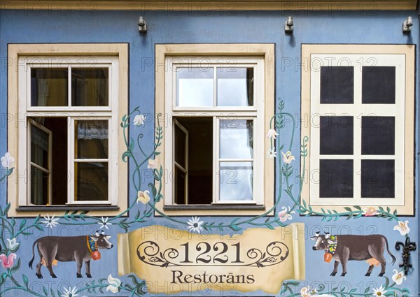 Painted house facade in the old town Vecriga