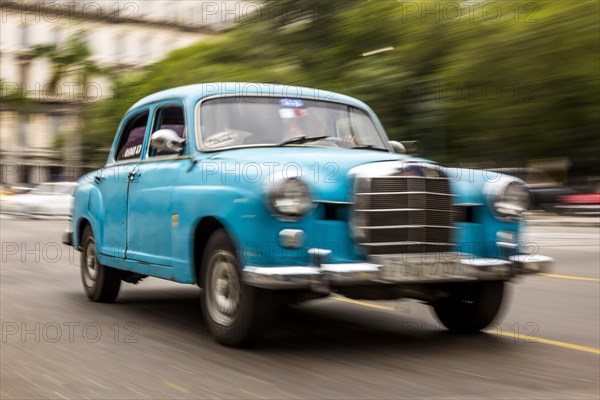 Old blue classic Mercedes on the street