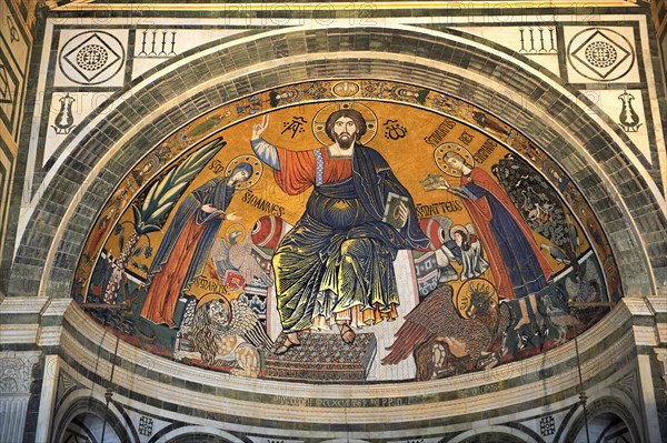 The medieval Romanesque style Byzantine mosaic of Christ between the Virgin Mary and St Minias