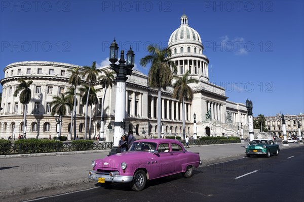 Vintage cars on the Prado in front of the Capitol