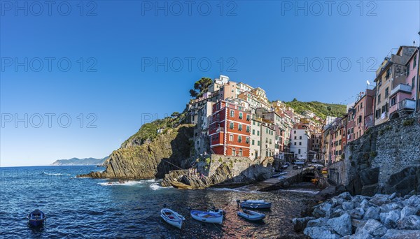 Town view with harbor and colorful houses