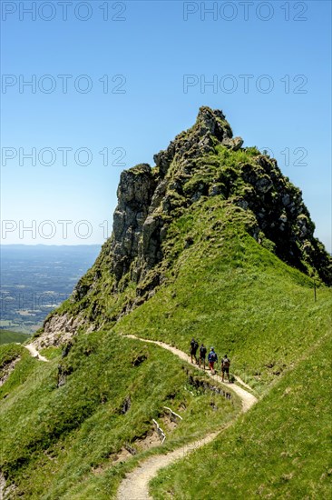 Hikers on way in the Massif of Sancy