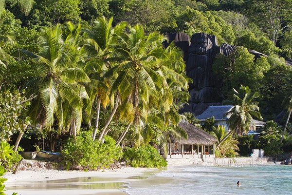 Beach at Anse Takamaka with a restaurant and Villas Chez Batista