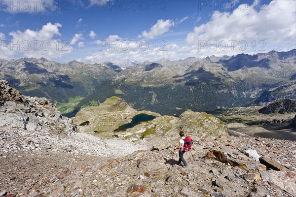 Climber descending from Schneebiger Nock mountain
