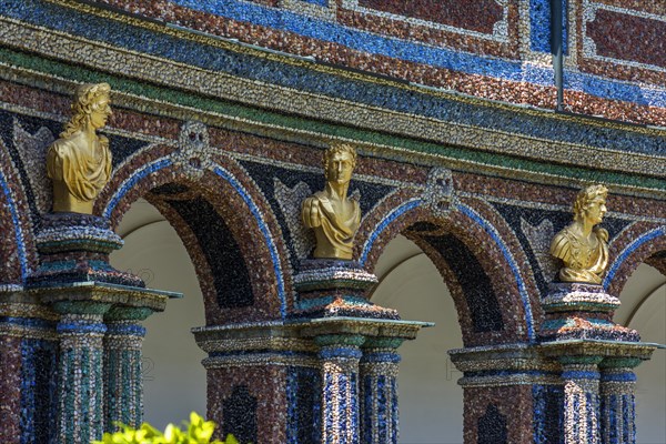 Arcades with golden busts of Roman emperors