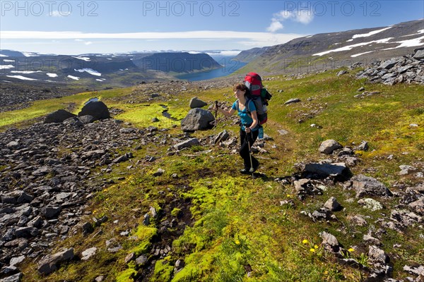 Young woman trekking